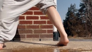 Bent over power pissing outside and farting loudly
